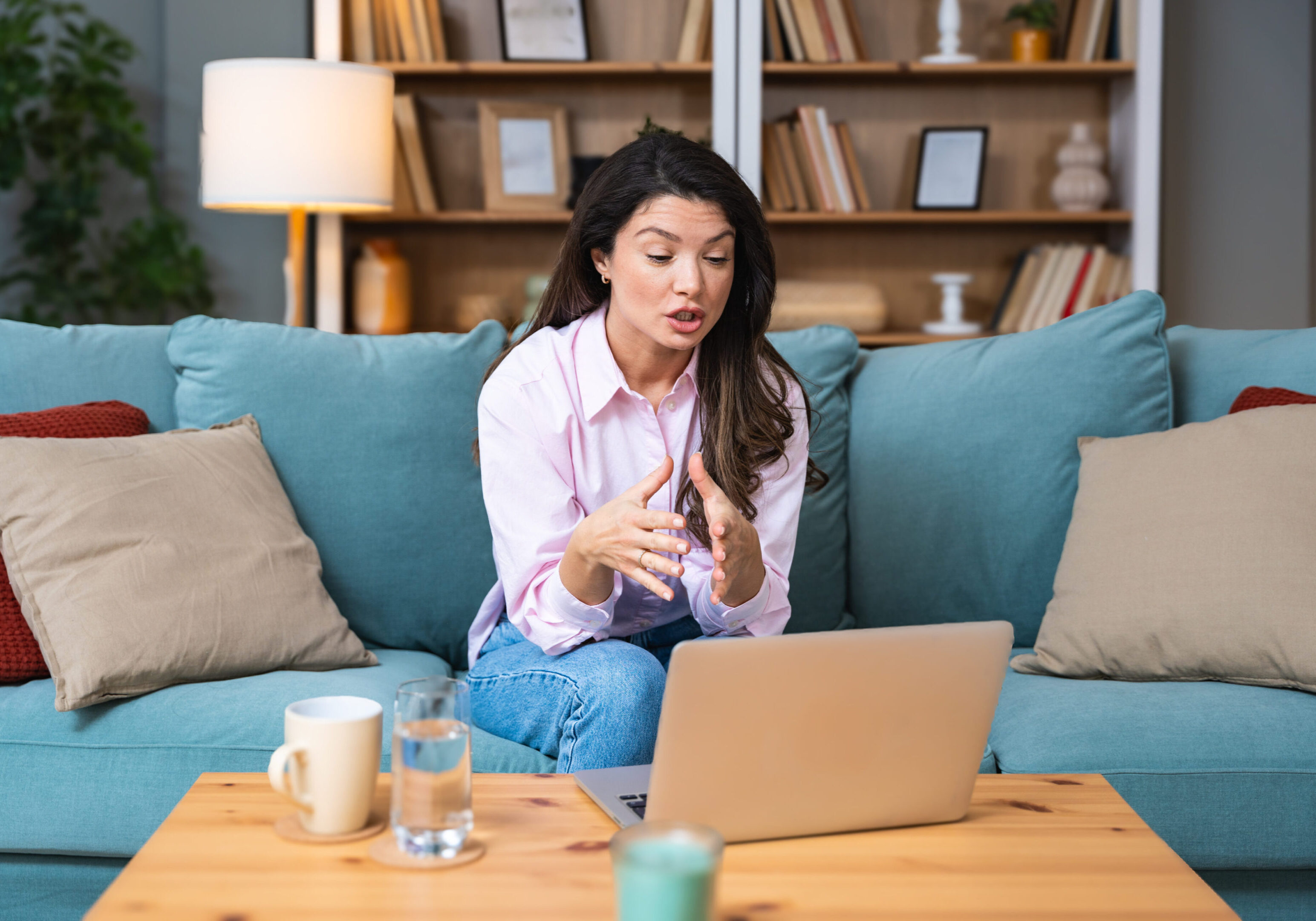 Telemedicine. Young woman doctor working at home office, private general practitioner, healthcare and medical female worker using laptop computer for contact with senior patients Helping people online